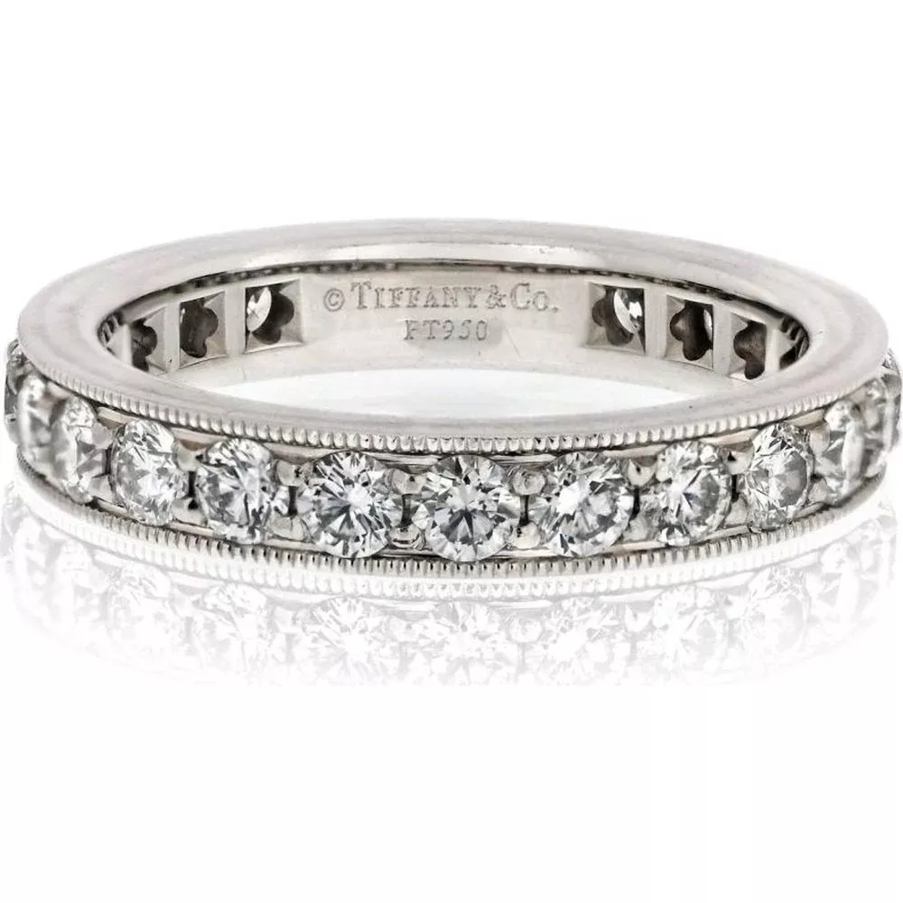 Tiffany & Co. Legacy Platinum Ring with 1.50 Carat Round Diamonds - Classic Luxury and Timeless Elegance